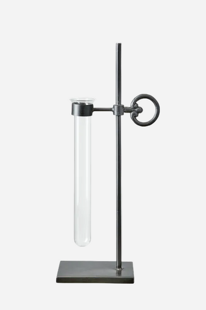 Olivia provrörsvas i glas med svart metallstativ