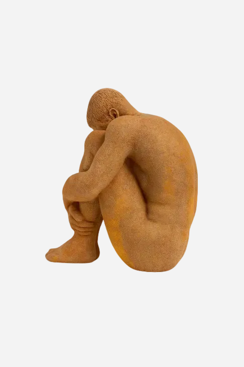 Sittande man